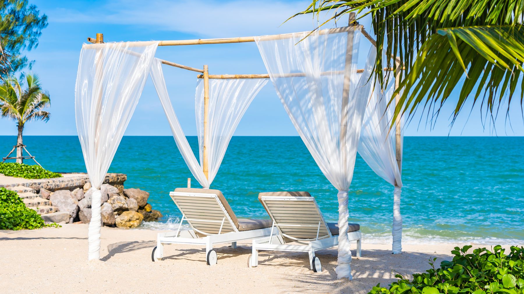Secluded honeymoon beach at sunset
